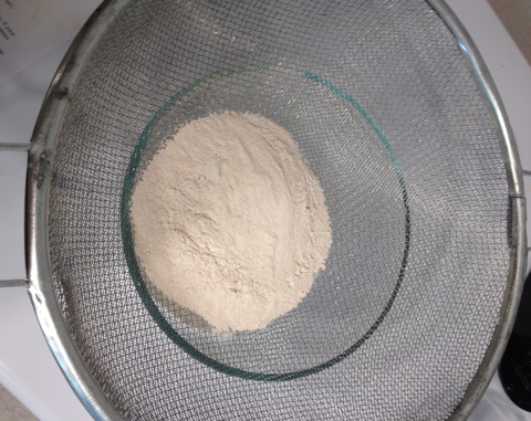Eggshell powder being sifted