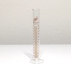 A 25mL graduated cylinder